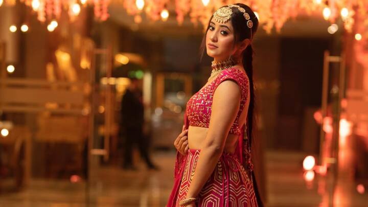 Drawing inspiration from Indian royalty, Shivangi looks stunning in this daring hot pink lehenga adorned with precise embroidery. Smokey eyes, light makeup, and time-tested accessories like chokers and bangles make the look exude sophistication. (Image Source: Instagram/ shivangijoshi18)