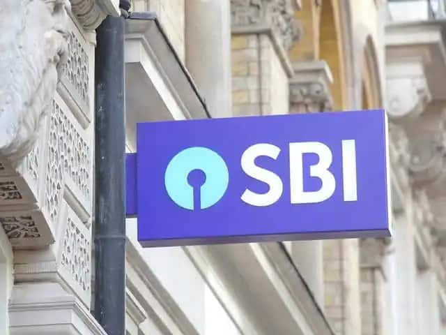 SBI FD Rates : ফিক্সড ডিপোজিটে সুদের হার কমাল এসবিআই, এখন কত কম টাকা পাবেন ? SBI state bank of india cuts fixed deposit interest rates know details SBI FD Rates : ফিক্সড ডিপোজিটে সুদের হার কমাল এসবিআই, এখন কত কম টাকা পাবেন ?