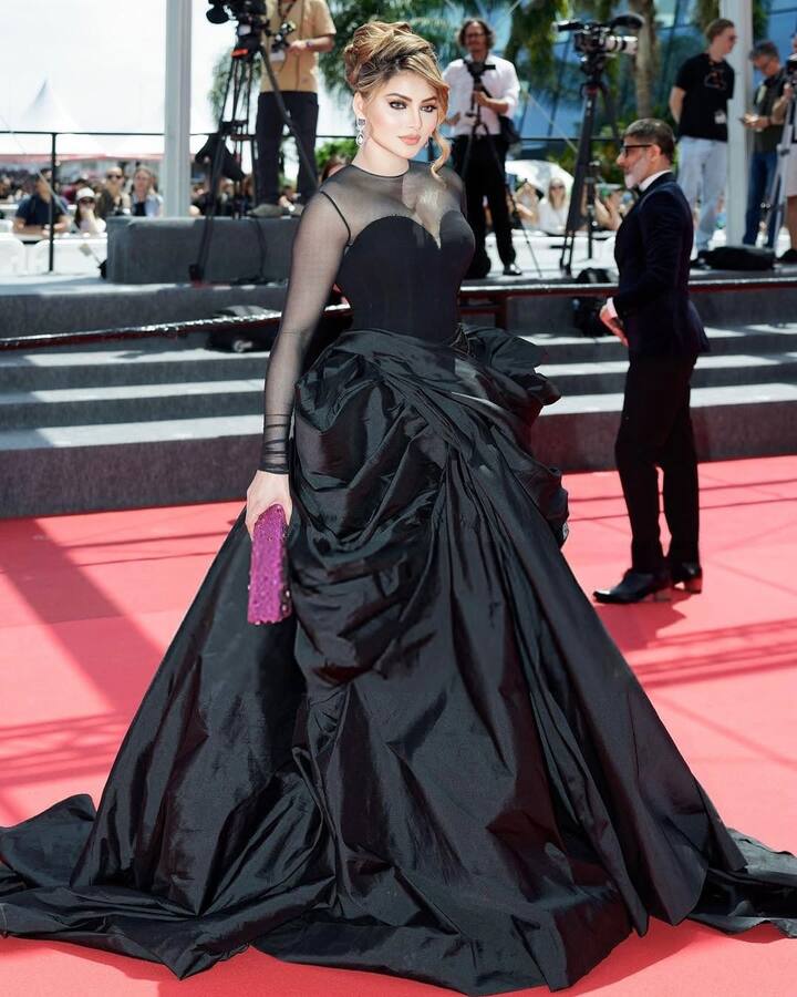 While some supported her effort to represent India, others compared her to Aishwarya Rai, commenting on charisma and fashion sense. (Instagram/urvashirautela)