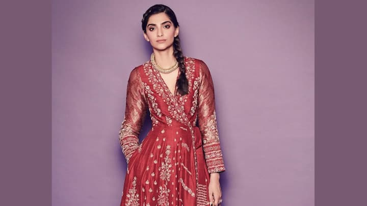 Sonam Kapoor's embroidered red raw silk Angrakha embodies the elegance of the old world with a twist. Brocade cuffs and ankle cut pants are distinctive choices for those who want to be different but traditional. (Image source: Instagram/ Sonamkapoor)