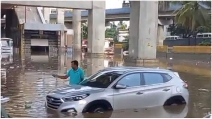 Panathur S Cross and Koramangala see residents pushing stalled cars in water. (Source: X)