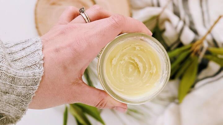7. Beeswax Hair Pomade: It provides scalp nourishment and tames fizz. A Beeswax Hair Pomade adds a natural shine and helps in defining curls, if any. It is also known to protect hair from moisture loss and environment damage. It's suitable for daily use, since it's free from all the chemicals. (Image Source: Pinterest/theherbeevore)
