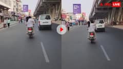 खौफ में है पूरा मर्द समाज! बाइक चला रहे पति को पीछे बैठकर चप्पलों से पीटती रही महिला, वीडियो वायरल