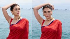 Aditi Rao Hydari :लाल साडी आणि भांगेत सिंदूर लावून कान्समध्ये पोहोचली आदिती राव हैदरी; पाहा फोटो!