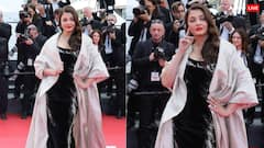 Cannes 2025: साड़ी के बाद कान्स में ऐश्वर्या राय ने ग्लैम लुक से ढाया कहर, काले लिबास पर खास बनारसी केप पहने दिए पोज, तस्वीरों पर दिल हारे फैंस