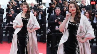 Cannes 2025: साड़ी के बाद कान्स में ऐश्वर्या राय ने ग्लैम लुक से ढाया कहर, काले लिबास पर खास बनारसी केप पहने दिए पोज, तस्वीरों पर दिल हारे फैंस
