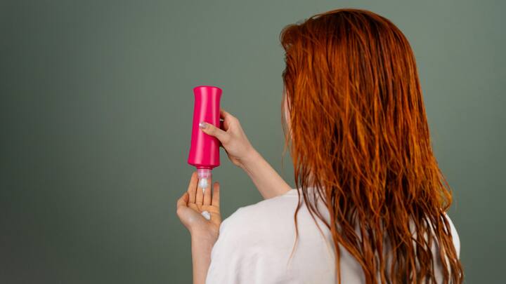3. Conditioner: Conditioning after every wash helps lock in moisture and smoothen the hair cuticle. It strengthens strands, minimises breakage, and prevents dryness. Regular conditioning may improve the hair texture which results in soft, shinier, and manageable hair. (Image Source: Canva)