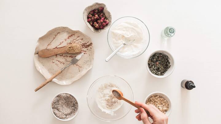 4. Hair Mask: Apply a deep conditioning hair mask at least once a week helps restore lost moisture and repair damage. It is a great way to strengthen the hair strands. Hair mask smoothens frizz, nourishes scalp, and reduces breakage, which promotes healthier and shinier hair. It helps in minimising hair fall over time. (Image Source: Canva)
