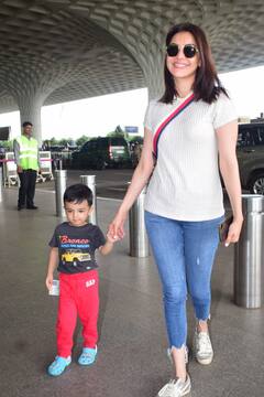 बेटे का हाथ थामे एयरपोर्ट पर स्पॉट हुईं काजल अग्रवाल, सिंपल लुक में भी लगीं खूबसूरत, देखें तस्वीरें
