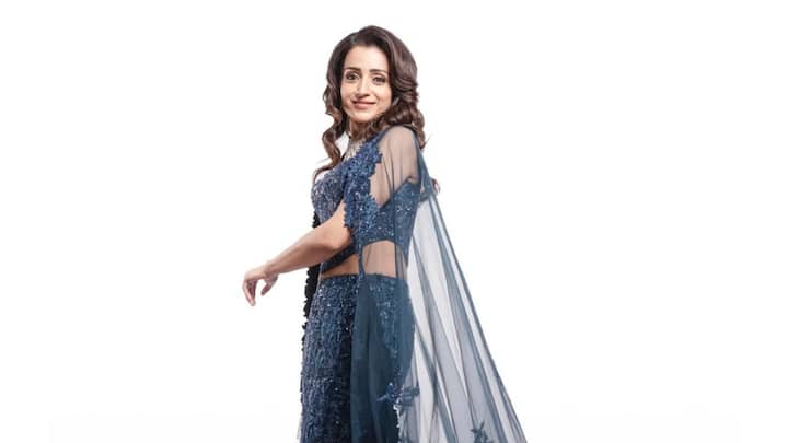 Trisha Krishnan stuns in a navy blue embellished lehenga by Mishru Official for the Thug Life audio launch.