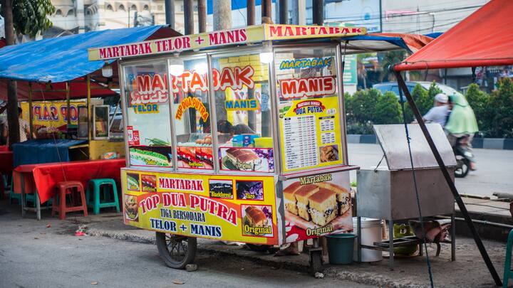 8. Avoid Street Food: It's essential to avoid street food during the rainy season as the risk of contamination increases. Rainwater often mixed with open food leads to bacterial growth and unhygienic conditions. Street vendors may not have access to clean water or maintain proper hygiene practices which can result in foodborne diseases like diarrhea, typhoid, and stomach infections. To stay healthy, it crucial to opt for fresh, home cooked food during monsoon season, ensuring taste and cleanliness, without compromising health. (Image Source: Canva)