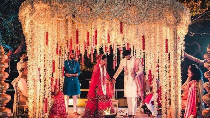 The Rituals: The pheras, the vows, the rings, the mangalsutra—these are not mere traditions; these are your commitments captured on film. Shooting these in close-ups, aerials, and reactions lends depth to the movie. (Image Source: Pinterest/ madhulikaj8