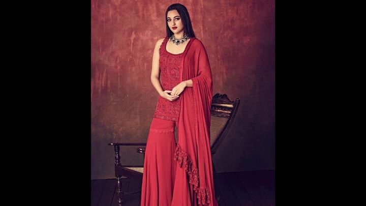 2. Sonakshi Sinha: Sonakshi Sinha served the trendy monochromatic look with her deep red-coloured gharara set. The traditional outfit featured a sleeveless and fitted short kurti with a flowy gharara and matching dupatta. The kurti had matching embroidery on it that enhaced the look while the delicate lace and fringe work on the dupatta added sophistication. For a pop of colour, the actress paired her striking red look with a statement green necklace, making her traditional fit exuded royal flair. (Image Source: Instagram/@manishmalhotra05)