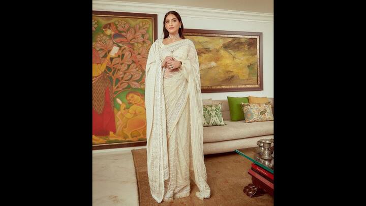 4. Sonam Kapoor: Sonam Kapoor wore a white saree that was adorned with fine embroidery and sequin detailing. The subtle saree reflected understated luxury which offering a striking balance for Eid festivities. The actress draped a matching dupatta across her shoulder to add elegance to her fit. She opted for pearl accessories which blended gracefully with the saree, featuring a unique wavy choker and delicate earrings. (Image Source: Twitter/@filmfare)