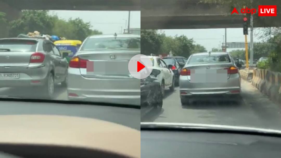 Driver left the car in the middle of the road at traffic light and went to get alcohol causing traffic jam video viral लाल बत्ती पर लगी शराब की तलब, ट्रैफिक के बीच कार छोड़कर बेवड़े ने किया चौराहा जाम- देखें वीडियो