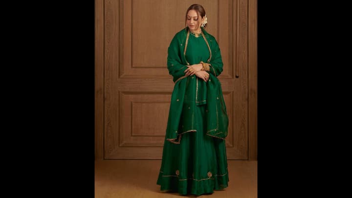 6. Sonakshi Sinha: Sonakshi wore a rich emerald three-piece set that featured a flowy kurta, lehenga, and dupatta. The lustrous fabric enhanced the richness of the colour while the subtle gold gota work added a glimmering touch. The Bollywood actress paired her traditional look with Indian gold jewellery and golden high heels. The ensemble gave the actress a refined yet celebratory look along with traditional and regal charm. (Image Source: Instagram/@aslisona)