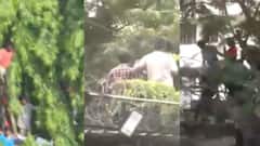 PHOTOS: चिन्नास्वामी स्टेडियम की दीवारों पर चढ़े फैंस, अचानक मच गई चीख-पुकार; RCB विक्ट्री परेड में पसर गया मातम!