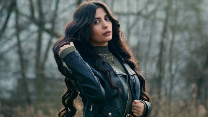 Leather Jackets: Classic and cool, leather jackets are once again leading the pack. In classic black or bright colours, they go with anything—jeans, dresses, and hoodies—for an instantly cool style. (Image Source: Canva)