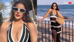 स्पेन में वेकेशन एंजॉय कर रही हैं प्रियंका चाहर, समंदर किनारे जालीदार ड्रेस में दिए ऐसे-ऐसे पोज