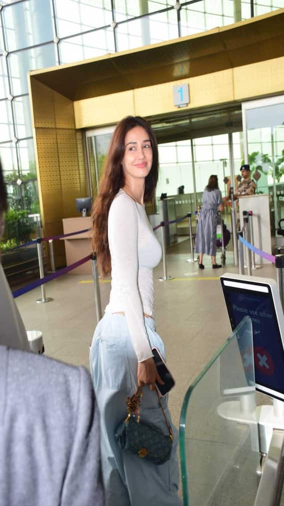 Disha Patani's Airport Look: Effortless Glam In Cargo Pants & Fitted Tee
