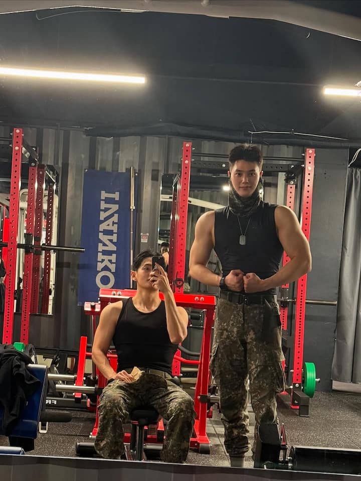 Additional photos included group shots with fellow soldiers, a gym mirror pic, and a basketball court selfie.