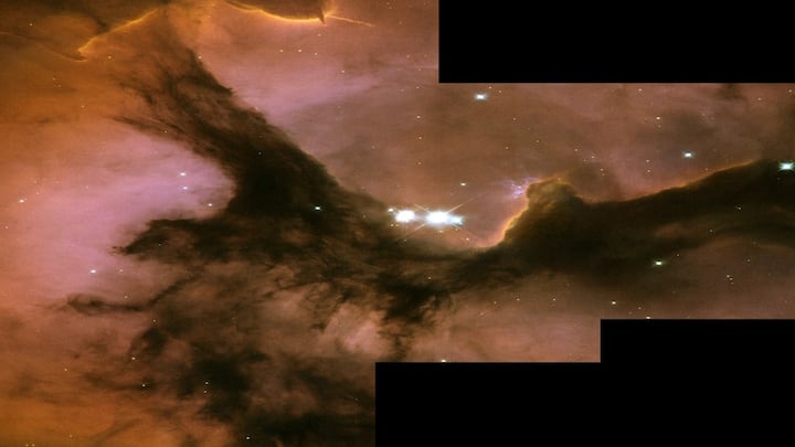 15 Must-See Nebulae Photos Captured by NASA The Trifid Nebula, about 5,200 light-years away in the Sagittarius constellation, is famous for its three dark dust lanes that divide its glowing pink core. It’s a rare combination of an emission, reflection, and dark nebula all in one.