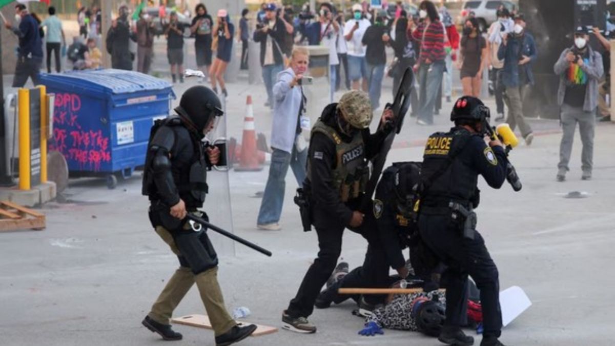 Protests Against Immigration Arrest Intensifies In LA As Police Use Tear Gas