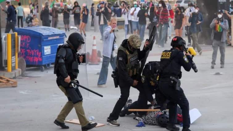 Protests Against Immigration Arrest Intensifies In LA As Police Use Tear Gas