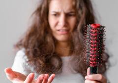 Health Tips: હેર લૉસની સમસ્યાથી પરેશાન છો તો આ વિટામિનની ઉણપના છે સંકેત