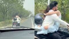 नोएडा में चलती बाइक इश्क फरमा रहा था कपल, ट्रैफिक पुलिस ने ऐसे सिखाया सबक, पड़ गए लेने के देने