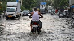दिल्ली में भारी बारिश से जाम, सड़कों पर भरा पानी, 12 फ्लाइट डायवर्ट, IMD ने जारी की एडवाइजरी