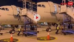 प्लेन से सीढ़ी हटाते वक्त लापरवाही! विमान से सीधे नीचे गिरा शख्स- वीडियो देख अटक जाएंगी सांसे