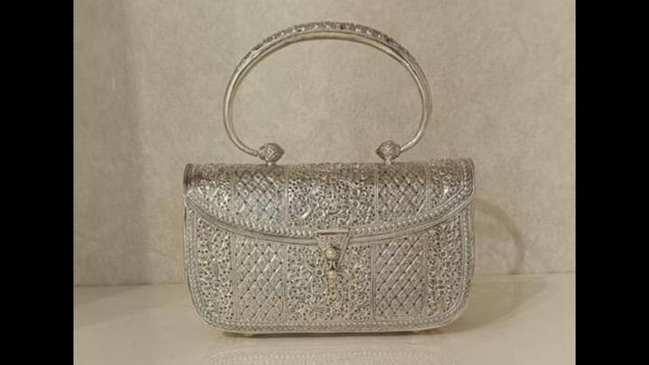 2. Silver Filigree Clutch Purse: This beautiful Silver Filigree Clutch Purse from Cuttack, Odisha was presented to Mary Simon, Governor General of Canada. The purse showcases Odisha's famous 500 year old traditional craft, Tarakasi. This traditional craft was once supported by kings, influenced by Mughal and temple art. The artifact was made using very fine silver wires that were twisted and shaped into delicate, lace-like designs. (Image Source: Twitter/@ANI)