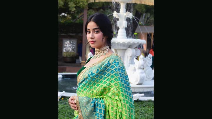 4. Janhvi Kapoor: Janhvi Kapoor radiated timeless grace in a vibrant green and blue bandhani saree, with a beautiful fusion of tradition and youthfulness. Drenched in the age-old Bandhej tie-dye technique, this silk Bandhani saree is a celebration of Rajasthan and Gujarat’s textile legacy. The delicate jaal patterns, typical of classic Bandhani craft, enhanced the saree’s festive appeal. Janhvi paired this elegant drape with a rich emerald green blouse and a regal kundan choker necklace, perfecting the look with a low bun and soft glam makeup. (Image Source: Instagram/@janhvikapoor)