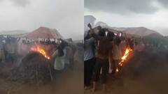 MP: दतिया में तिरपाल के नीचे हुआ महिला का अंतिम संस्कार, बारिश ने खोली विकास के दावों की पोल