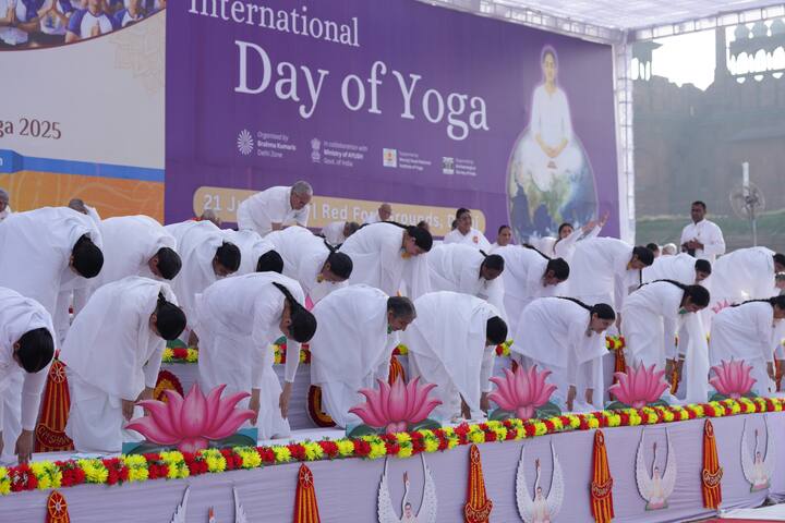 Members of Brahma Kumaris take part in a yoga session, organised on the International Day of Yoga, at the Red Fort Complex in New Delhi. (Image Source: PTI Images)
