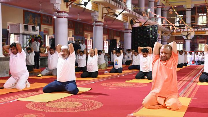 Uttar Pradesh Chief Minister Yogi Adityanath takes part in 'Mass Yoga Practice Program', organized on International Day of Yoga, in Gorakhpur. (Image Source: PTI Images)