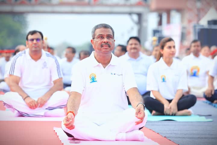 Union Minister Dharmendra Pradhan Marks Yoga Day In Sambalpur; IN PICS Union Minister Dharmendra Pradhan marked the 11th International Yoga Day with great enthusiasm in Odisha’s Sambalpur, joining thousands of citizens, students, and volunteers for a mass yoga session at the revered Mother Samaleswari Peetha and the scenic banks of the Mahanadi River.