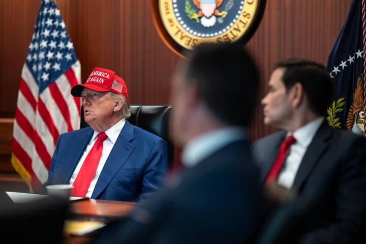 US President Donald Trump is seen seated at the helm of the Situation Room table on Sunday.