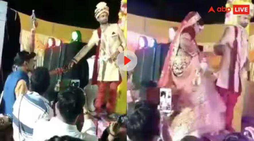 bride fired in the air at the wedding the groom was shocked video goes viral ਪਹਿਲਾਂ ਲਾੜੇ ਦਾ ਹੱਥ ਫੜਿਆ ਤੇ ਫਿਰ ਹਵਾ ਵਿੱਚ ਚਲਾਈ ਗੋਲੀ...., ਲਾੜੀ ਨੇ ਸਟੇਜ 'ਤੇ ਹੀ ਦਿਖਾਈ 'ਬਦਮਾਸ਼ੀ', ਦੇਖੋ ਪੂਰੀ ਵੀਡੀਓ