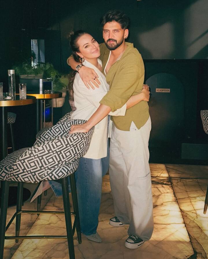 The bonding and smile of both of them clearly tells how happy this couple is with each other.