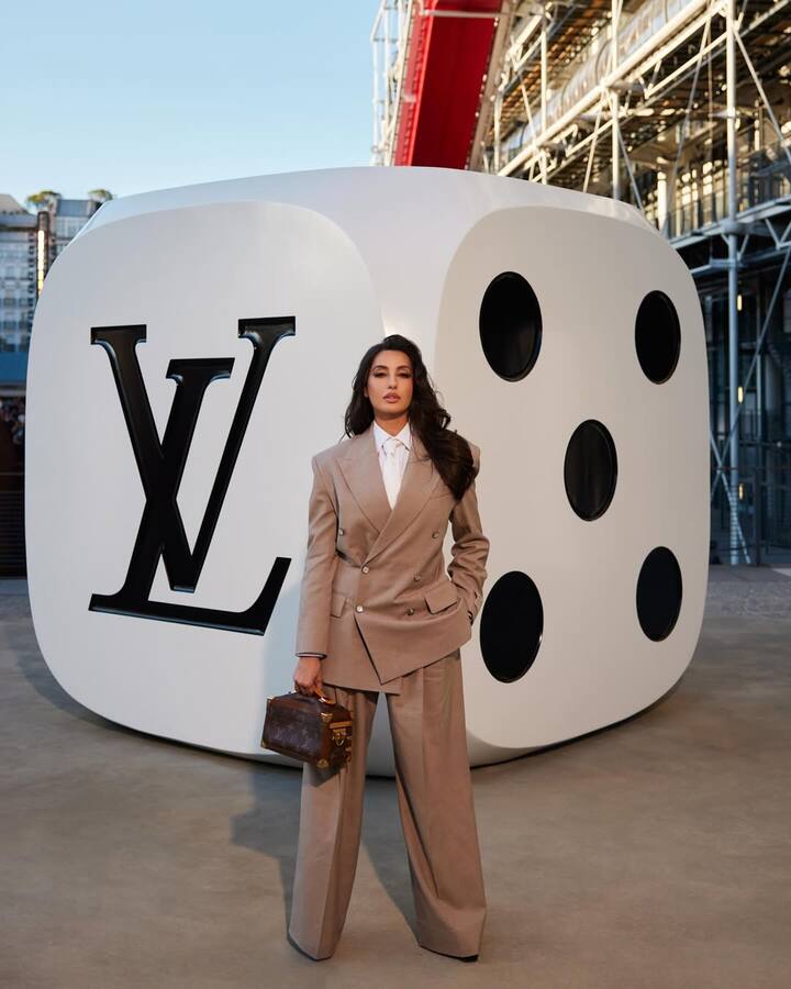 Her appearance at Paris Fashion Week wasn’t just a style moment—it was a fashion power move. By embracing structured tailoring with feminine flair, Nora proved that power dressing can be as glamorous as it is commanding, setting a new benchmark for modern-day fashionistas. (All Image: Nora Fatehi/Instagram.)