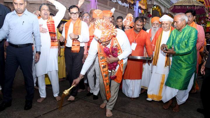 Gujarat Chief Minister Bhupendra Patel performs the traditional 'Pahind' ceremony by sweeping in front of the main chariot with a golden broom before flagging off the 148th Rath Yatra of Lord Jagannath, in Ahmedabad. (Image Source: PTI Images)