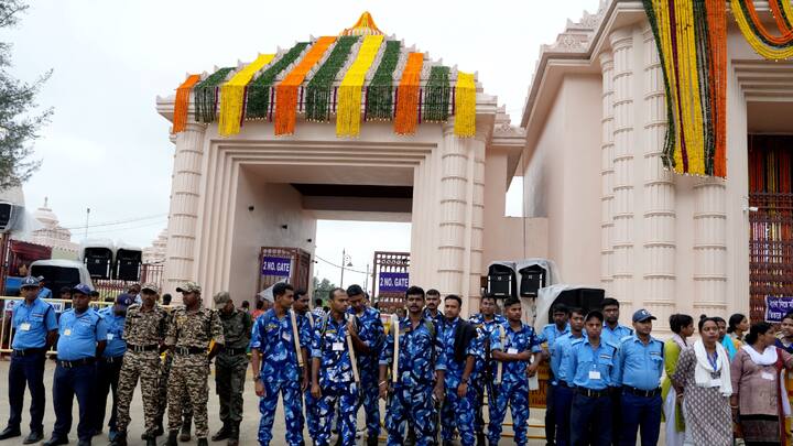 Security personnel stand guard outside Jagannath Dham ahead of Lord Jagannath Rath Yatra, in Digha, West Bengal. (Image Source: PTI Images)