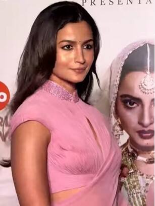 Alia Bhatt graced the screening in a stunning pink saree, thoughtfully styled as an homage to one of Rekha’s iconic saree looks from the classic film Silsila.