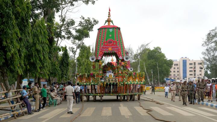 Security personnel stand near the 'chariot' outside Jagannath Dham ahead of Lord Jagannath Rath Yatra, in Digha, West Bengal. (Image Source: PTI Images)