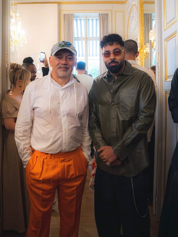 PICS: Badshah Brings Desi Swagger To Paris Fashion Week 2025 Badshah was dressed in a faux leather olive-hued button-down shirt, perfectly paired with straight-fit black trousers.