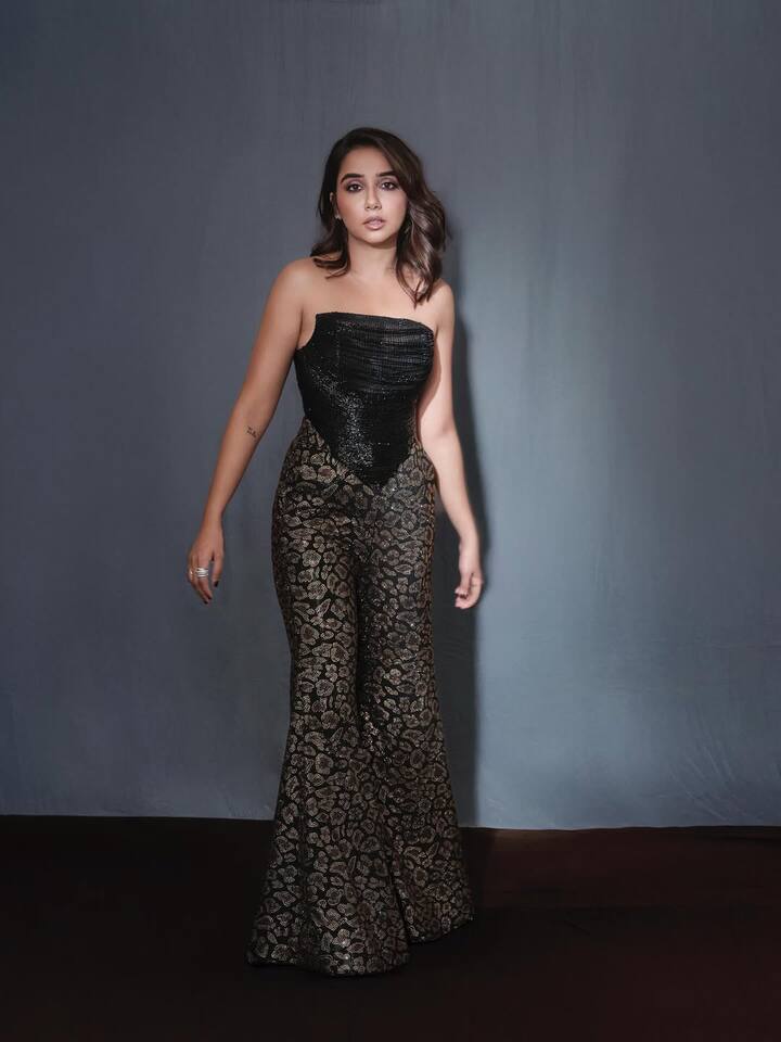 Prajakta Koli turned up the glam in her latest photoshoot, exuding elegance and confidence in a striking black ensemble.