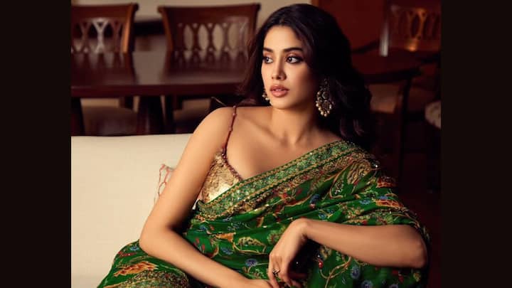 Janhvi Kapoor opted for this printed green saree combined with a sequin golden blouse that brought a party-like sparkle to it. Her attire was complemented by statement earrings and light make-up—perfect for night Teej celebrations. (Image Source: Instagram/ tanghavri)