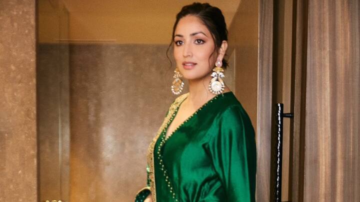 Yami Gautam embraced traditional charm in this solid emerald green Anarkali suit, paired beautifully with a classic bandhani dupatta. The simplicity of the silhouette made it perfect for Hariyali Teej's traditional vibe. (Image Source: Instagram/ yamigautam)